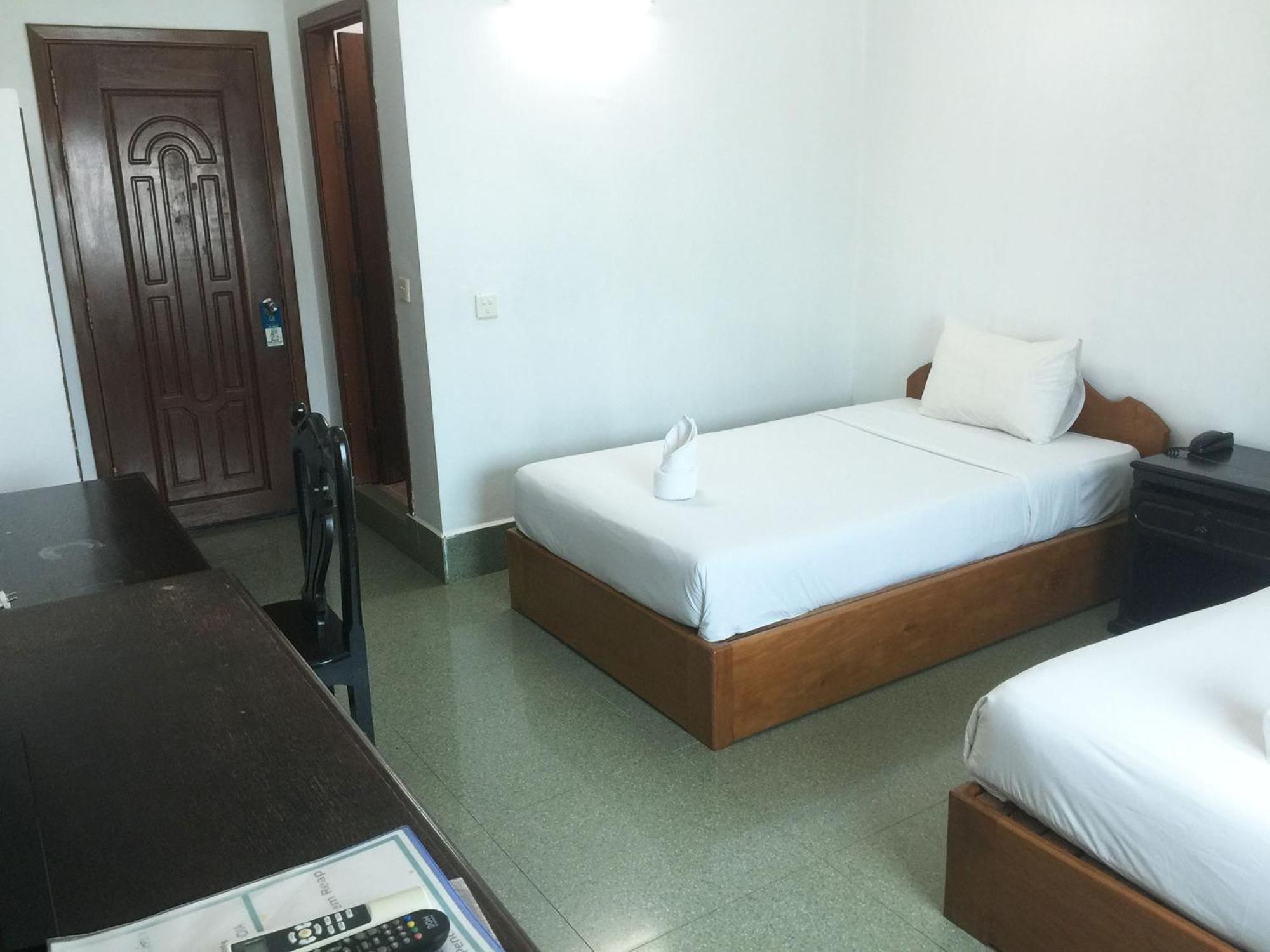 Central Night Hotel Ciudad de Siem Riep Habitación foto